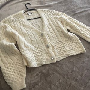 Never worn sweater. So cute with rhinestone buttons